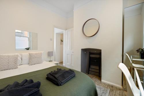 Katil atau katil-katil dalam bilik di Heart of London: 3 Bed near Oxford St and subway