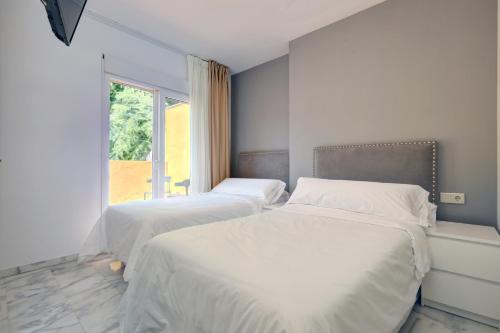 Postel nebo postele na pokoji v ubytování Hostal 37