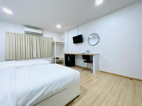 PD Apartment Innにあるベッド