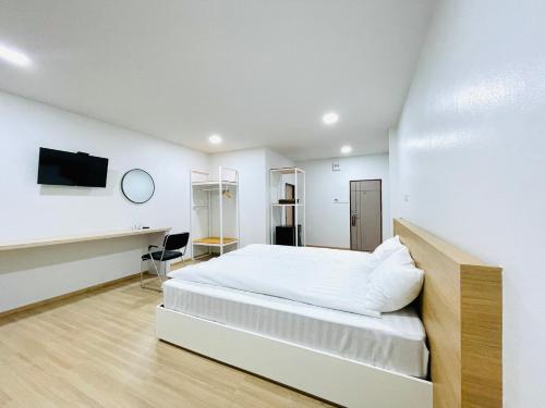 PD Apartment Innにあるベッド
