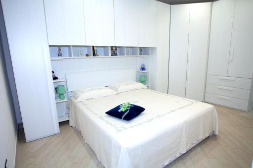 Ένα ή περισσότερα κρεβάτια σε δωμάτιο στο B&B MaryGe