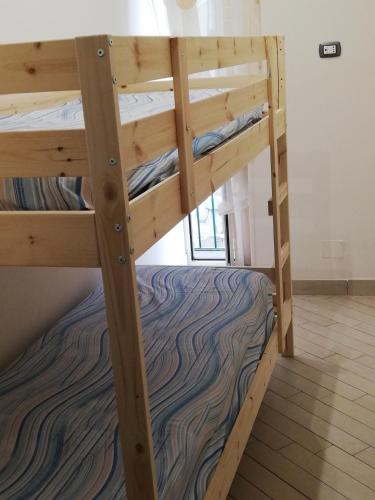 Ένα ή περισσότερα κρεβάτια σε δωμάτιο στο B&B MaryGe