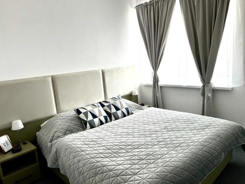 Posteľ alebo postele v izbe v ubytovaní Urban GREEN apartment