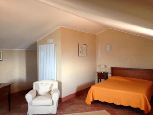 Postel nebo postele na pokoji v ubytování Antica dimora Palazzo Rossi