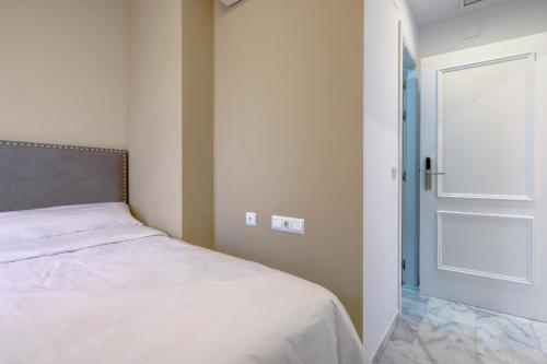 Postel nebo postele na pokoji v ubytování Hostal 37
