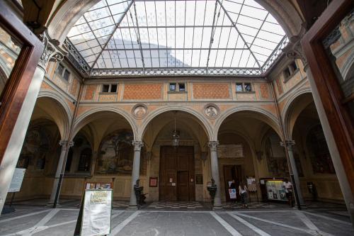 a large building with a glass ceiling and a large door at David Sweet Suite in Florence