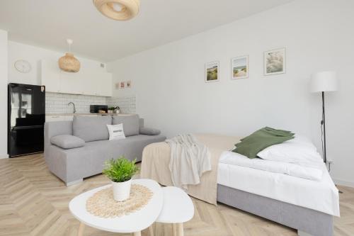 Katil atau katil-katil dalam bilik di Ursus Sunny Studio for 4 Guests with Parking & Balcony by Renters
