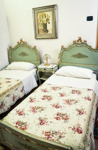 Ένα ή περισσότερα κρεβάτια σε δωμάτιο στο Bed & Breakfast Il Giardino