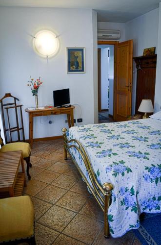 Ένα ή περισσότερα κρεβάτια σε δωμάτιο στο Bed & Breakfast Il Giardino