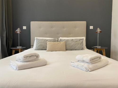 Ліжко або ліжка в номері Charming Puerta de Toledo III