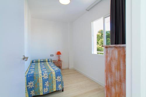 Cama ou camas em um quarto em Apartamentos InterSalou Priorat