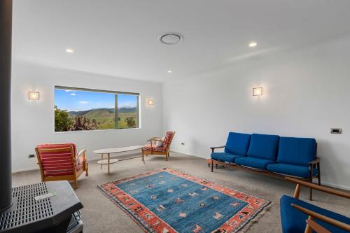 Un lugar para sentarse en One Two Eight - Richmond Holiday Home