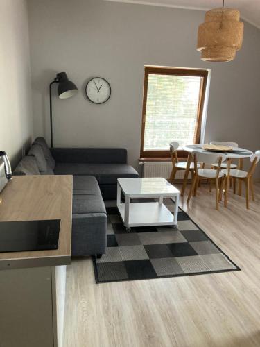 Posedenie v ubytovaní Apartament w Parku Planty