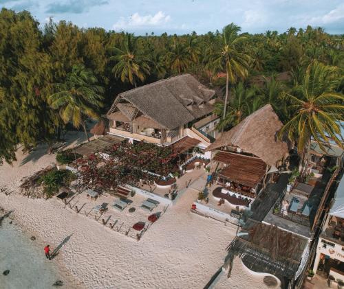an aerial view of a resort on a beach at Mr Kahawa Lofts in Paje