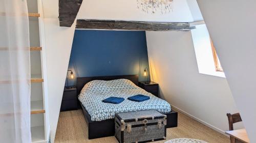 Postel nebo postele na pokoji v ubytování Maison du vignoble
