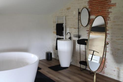 Koupelna v ubytování Les Chambres des Ardillers