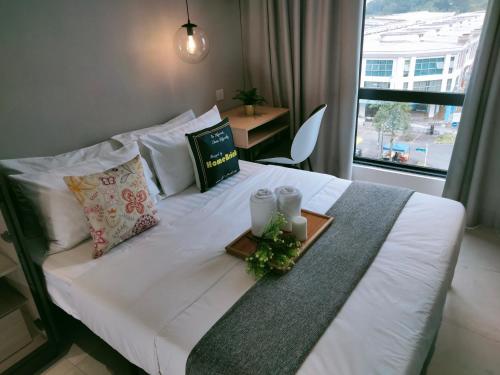 Ліжко або ліжка в номері DK 2BR 5Pax with balcony NEAR Subang Airport