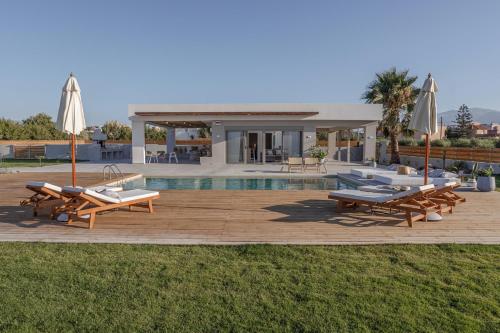 The swimming pool at or close to Athena Luxury Villa by Estia