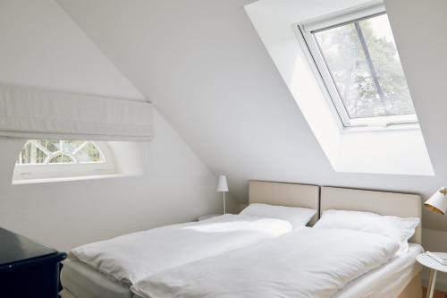 מיטה או מיטות בחדר ב-Schmiede