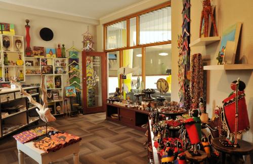 a room with a room filled with lots of items at Cresta Sprayview Victoria Falls in Victoria Falls