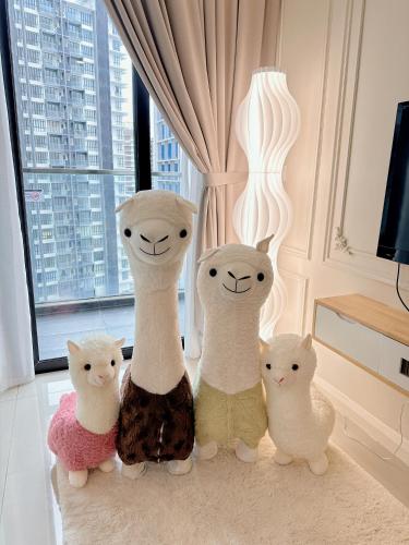 a group of stuffed teddy bears sitting in a room at Opposite Legoland 5mins Medini DPristine 8 to 10pax in Nusajaya