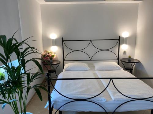 Katil atau katil-katil dalam bilik di Apartments Roberta