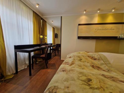 Cama o camas de una habitación en Laurentius Boutique-Hotel & Restaurant