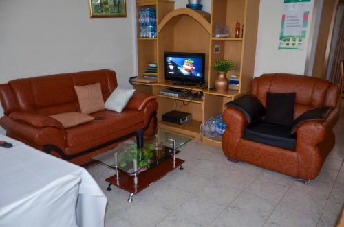 Ein Sitzbereich in der Unterkunft Salient Guest House