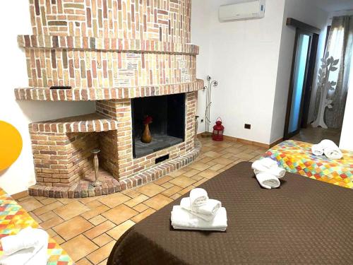 A bed or beds in a room at Villa Grisì