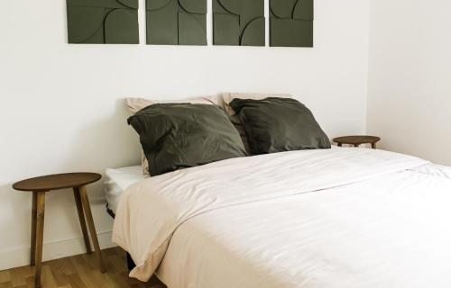 מיטה או מיטות בחדר ב-Charment appartement à Marseille - Prado A/C