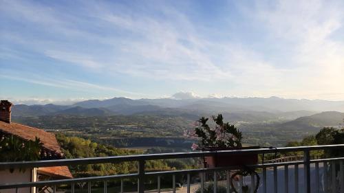 a view of the mountains from a balcony of a house at Peter Pan in Castellino Tanaro
