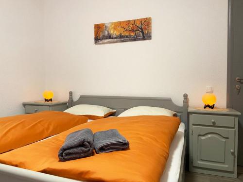 Giường trong phòng chung tại Soba za goste Kraljica 4