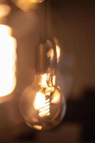 a glass vase with lights in the background at LOFT Design Studio 600m zur Messe/Lanxess in Cologne