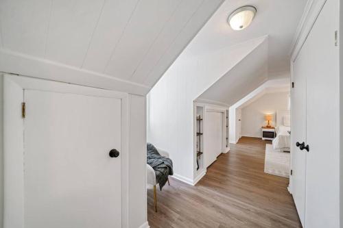 an attic bedroom with white walls and a white ceiling at 1255 Ashbridge, West Chester, PA in West Chester