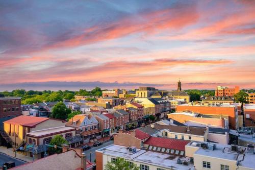 an aerial view of a city at sunset at 1255 Ashbridge, West Chester, PA in West Chester