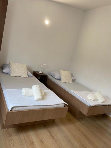 Cama o camas de una habitación en Apartmani Sunset
