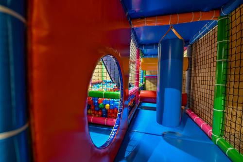 an image of a play set in a bounce house at Pod Tatrami 1 - świetna lokalizacja - sauna fińska oraz infrared i grota solna - jedno wejście gratis in Białka Tatrzanska