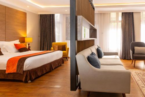 Postel nebo postele na pokoji v ubytování Alba Hotel Meru