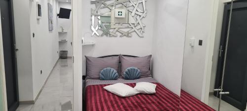 Postel nebo postele na pokoji v ubytování Apartman Julija 1