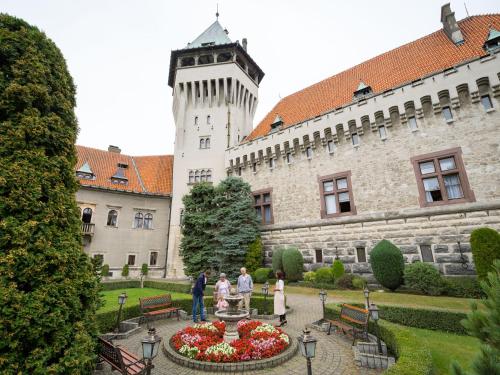 a group of people standing in front of a building at Smolenický zámok in Smolenice