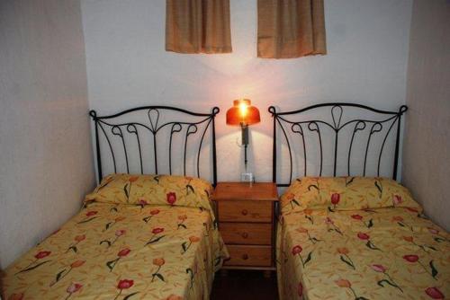 Postel nebo postele na pokoji v ubytování Bungalow Almadrava 11 Con Vistas al Mar