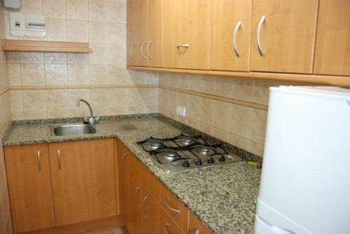 Kuchyň nebo kuchyňský kout v ubytování Bungalow Almadrava 11 Con Vistas al Mar