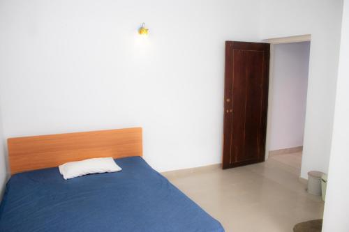 Postel nebo postele na pokoji v ubytování Mount Guest