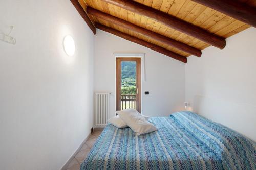 Postel nebo postele na pokoji v ubytování Casa Sabrina - Appartamento Bianco