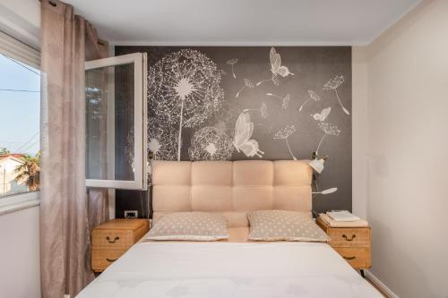 Adastra apartments with flour heating, private parking and sea view