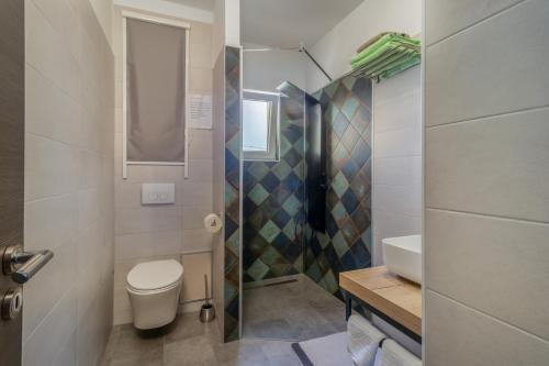 Adastra apartments with flour heating, private parking and sea view