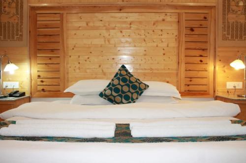 Ein Bett oder Betten in einem Zimmer der Unterkunft Hotel Zion