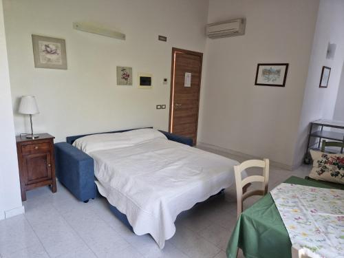 Un ou plusieurs lits dans un hébergement de l'établissement Agriturismo Camparella
