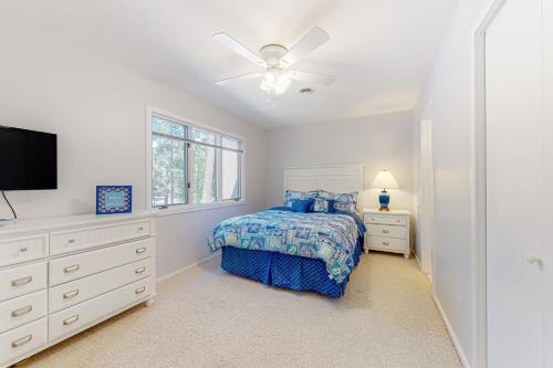 Ένα ή περισσότερα κρεβάτια σε δωμάτιο στο Villas of Bethany West - 792B Salt Pond Circle