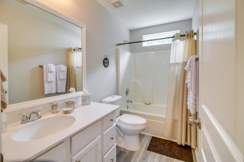 a bathroom with a sink and a toilet and a shower at Cozy North Carolina Abode - Minutes from Downtown! in Mount Holly